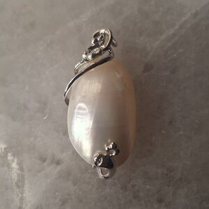 Elegant Silver and Cream Pendant
